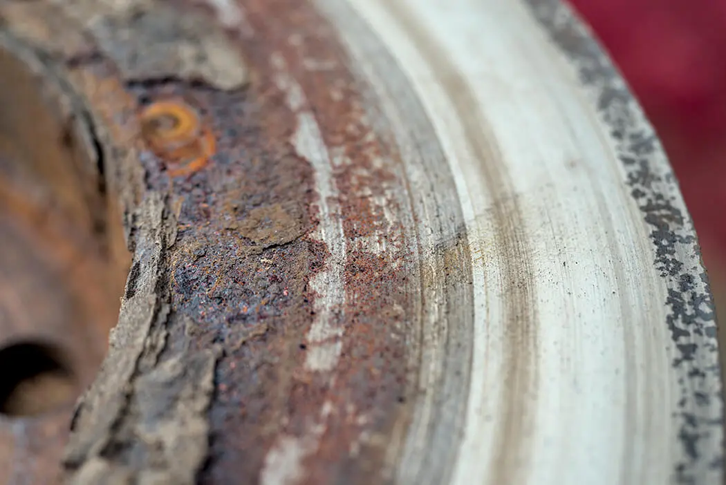 Heavily damaged and corroded disc brake rotor